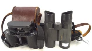 Two pairs of binoculars,