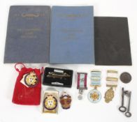 A collection of Masonic jewels and related wares, to include books, badges,