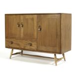 An Ercol blonde elm and beech sideboard,