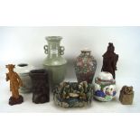 A collection of Chinese ceramics, stoneware and wood items including standing figures,