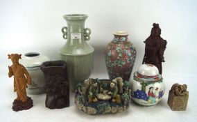 A collection of Chinese ceramics, stoneware and wood items including standing figures,