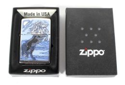 A boxed unused Zippo lighter,