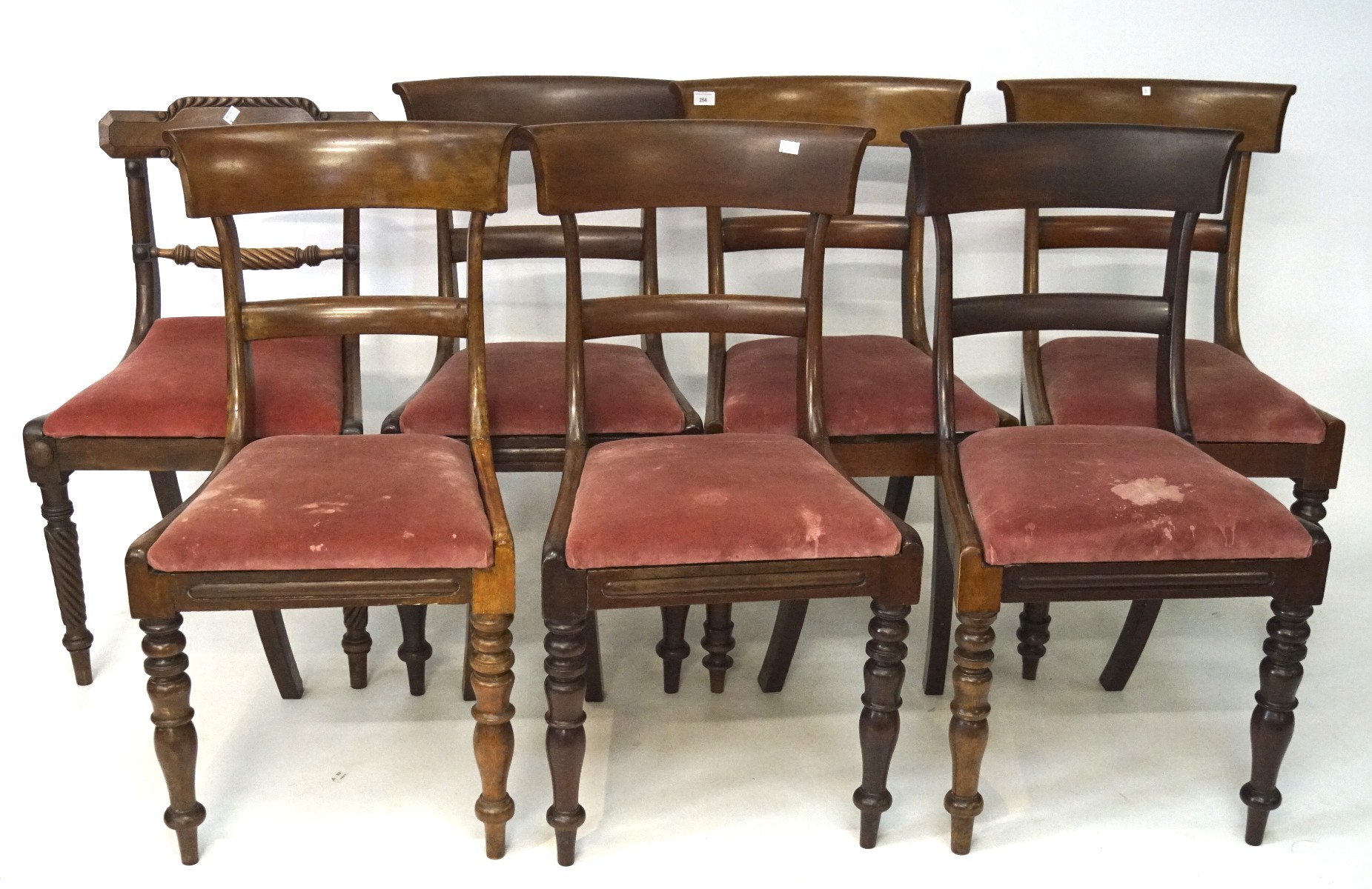 Early 20th century set of seven mahogany bar back dining chairs with pink upholstered drop in seats,