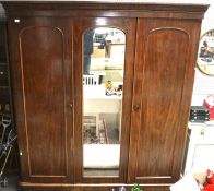 A Victorian mahogany three door linen press,