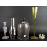 A collection of glassware including a goblet, cut glass candlestick, a glass dome ect,