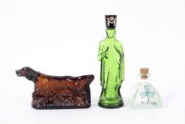Three vintage glass advertising bottles,
