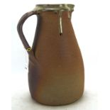 A large Studio Pottery pitcher, impressed B mark to base,