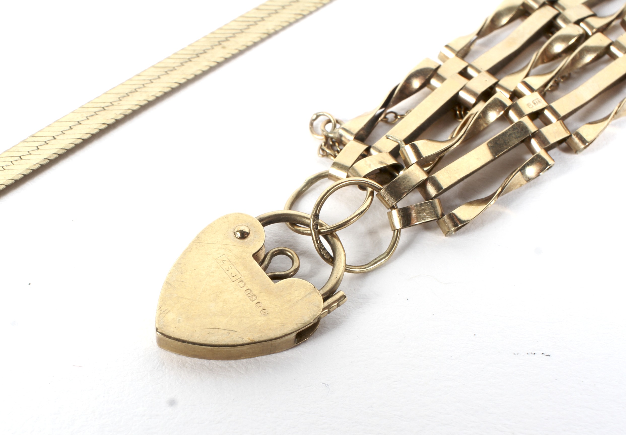 A 9ct gold gate bracelet with lock and safty chain together with a 9ct gold necklace, - Image 2 of 2