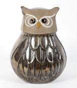 A contemporary pottery sculpture of an owl, in brown glaze, unmarked,