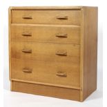 A Maples G-Plan chest of four graduating long drawers,