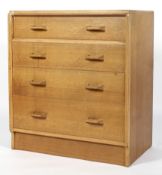 A Maples G-Plan chest of four graduating long drawers,