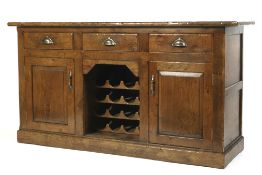 A 20th century oak sideboard,