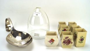 Seven Royal Doulton miniature vases and other items, the vases printed with flowers,