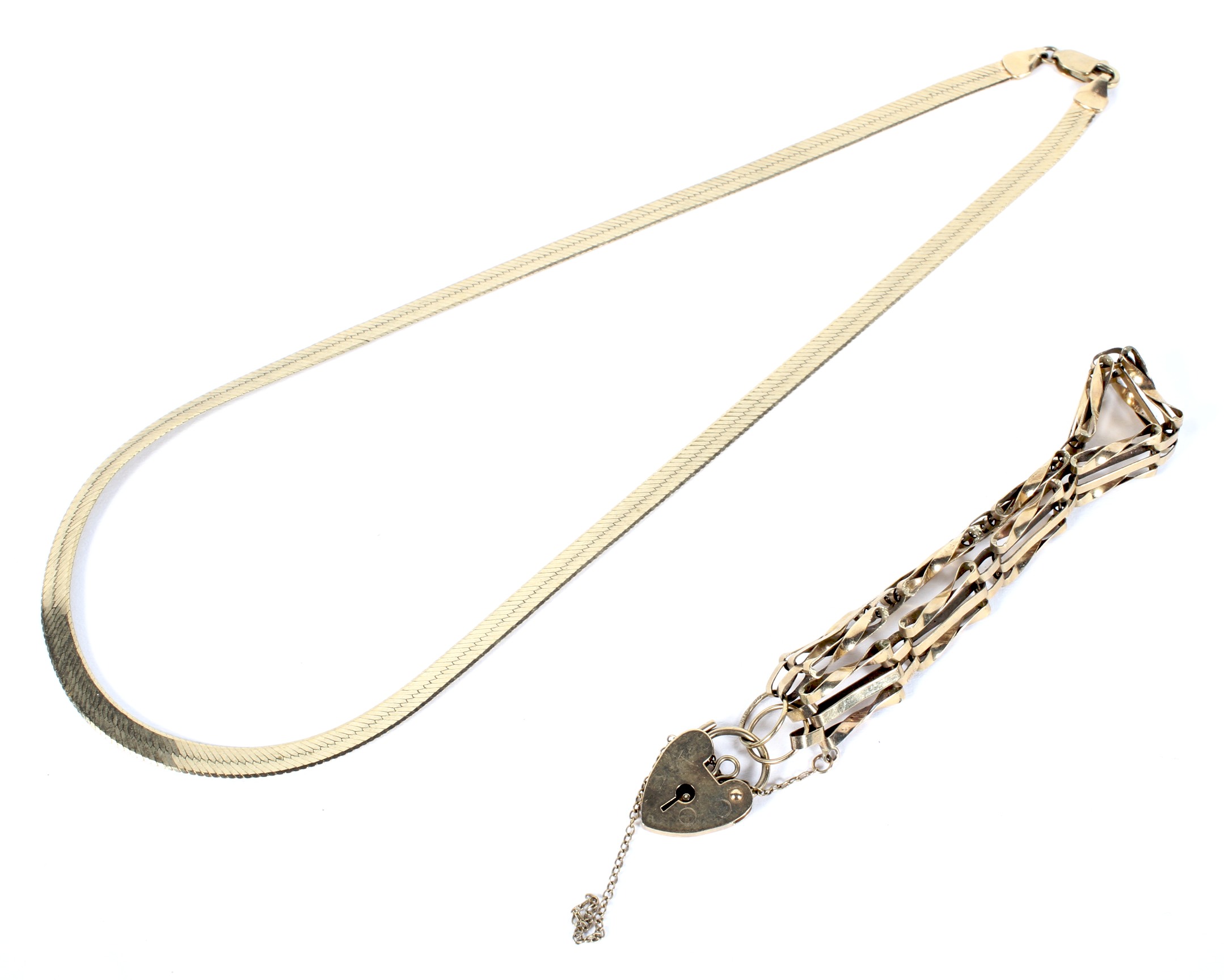A 9ct gold gate bracelet with lock and safty chain together with a 9ct gold necklace,