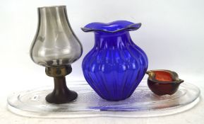 A collection of glassware, including: a lobed blue vase, a press-moulded fish dish,