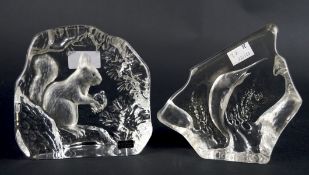 Two glass paperweights, comprising; a Kosta glass paperweight moulded with a squirrel,