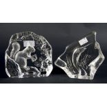 Two glass paperweights, comprising; a Kosta glass paperweight moulded with a squirrel,