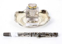 An assortment of ladies stationary, comprising a Waterman's sterling silver mounted fountain pen,