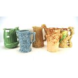 A group of five mid-century jugs, including Sylvac Wade and Weatherby,