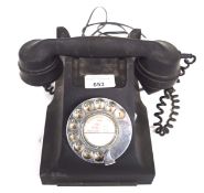 A vintage Bakelite telephone,