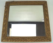 A 20th century gilt framed wall mirror, of rectangular form,