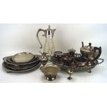 An assortment of silver plate, to include serving trays, silver plate mounted cut glass claret jug,