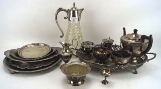 An assortment of silver plate, to include serving trays, silver plate mounted cut glass claret jug,