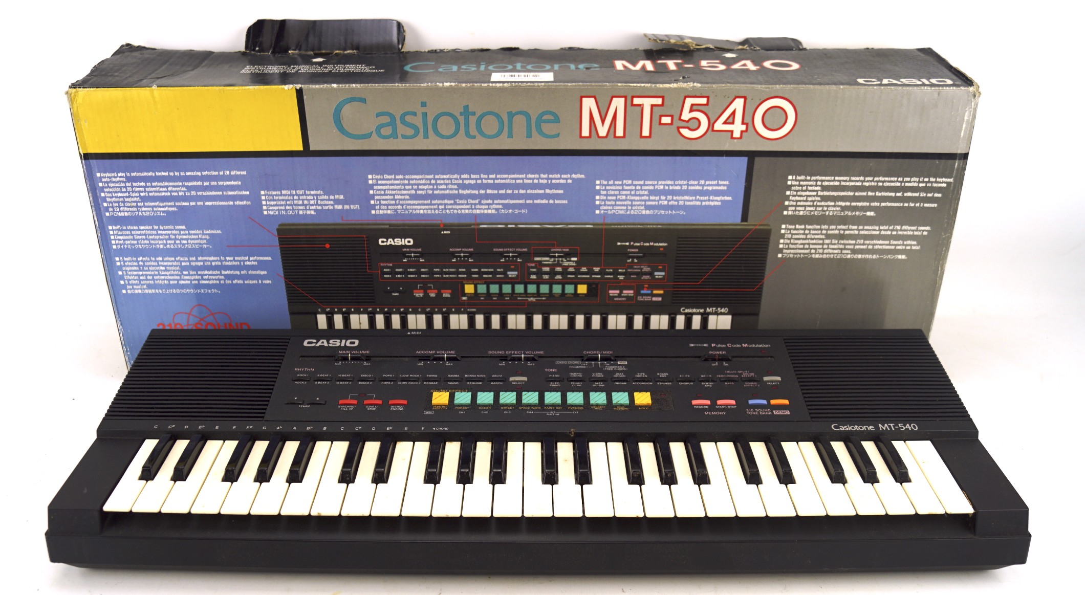 A Casio 210 sound tone bank keyboard, in original box,