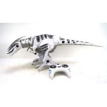 A Jaz Toys remote control white robot dinosaur, with remote control, approx.
