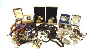 An assortment of costume jewellery, including earrings, necklaces, bracelets,