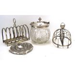 An assortment of silver plate, to include two six-slice toast racks,