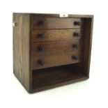 A oak tabletop collector's chest, containing four drawers (one missing) with turned handles, L30.