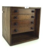 A oak tabletop collector's chest, containing four drawers (one missing) with turned handles, L30.