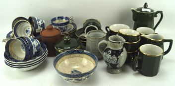 An assortment of part tea services and ceramics,