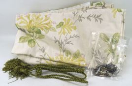 A pair of Laura Ashley curtains in the 'Hydrangea' pattern, lined,
