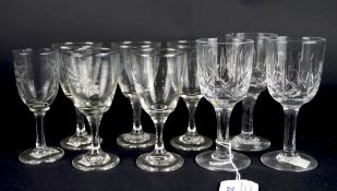An assortment of liqueur drinking glasses, with enamelled and engraved decoration of flowers,