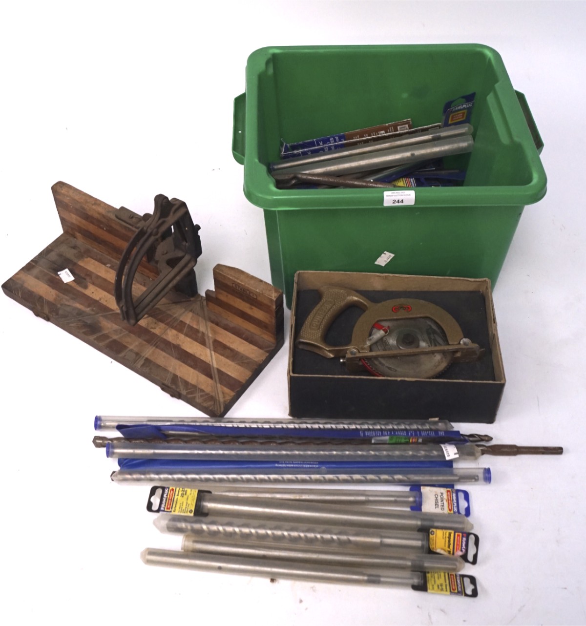 An assortment of vintage tools, to include a Quicksaw, Stanley Jigsaw stand, drill bits,