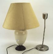 Two contemporary table lamps, one a chrome example with adjustable stem,