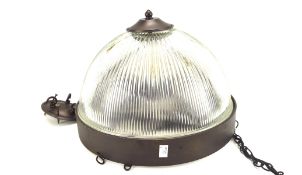 A vintage heavy hanging light, glass with metal mount, of domed form, H30cm,