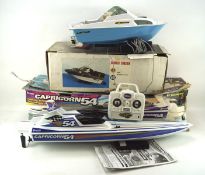 Two battery powered toy boats, comprising a Corsair II cruiser and a Compass Capricorn 54,
