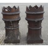 Two large stoneware chimney pots with zig-zag openein,