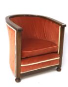A late 19th/early 20th century mahogany tub chair, with upholstered seat and back,
