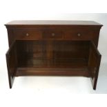 A contemporary stained wooden sideboard,