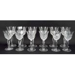A set of wine glasses, comprising six large and six short examples,