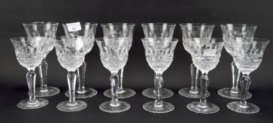 A set of wine glasses, comprising six large and six short examples,