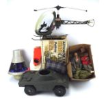 An assortment of vintage action men and accessories, including a Scout Car, helicopter,