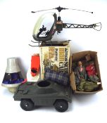An assortment of vintage action men and accessories, including a Scout Car, helicopter,