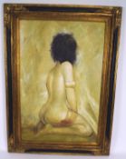 A large contemporary oil on canvas scene depicting a kneeling female nude, 59cm x 91cm,