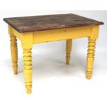 A vintage yellow-painted dining table/desk,