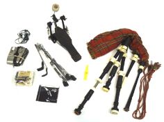 A 20th century set of bagpipes and a selection of musical related wares,